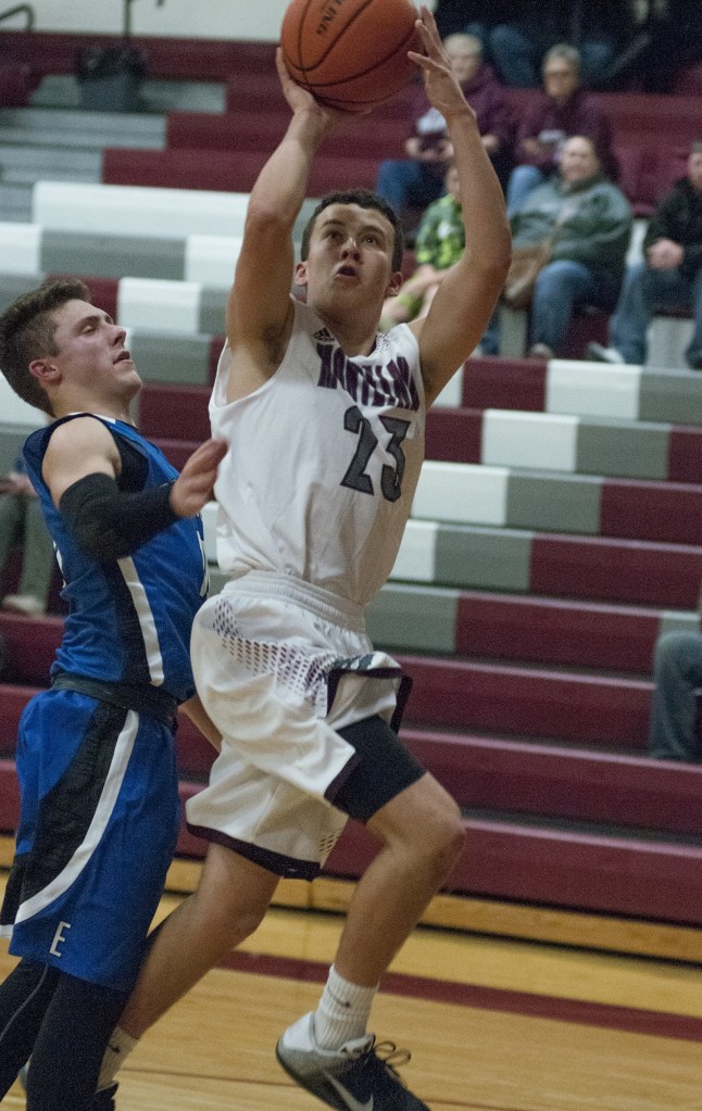 (Brendan Carl | The Daily World) Montesano&rsquo;s Noah Quinn twists to take a shot against Eatonville on Friday.