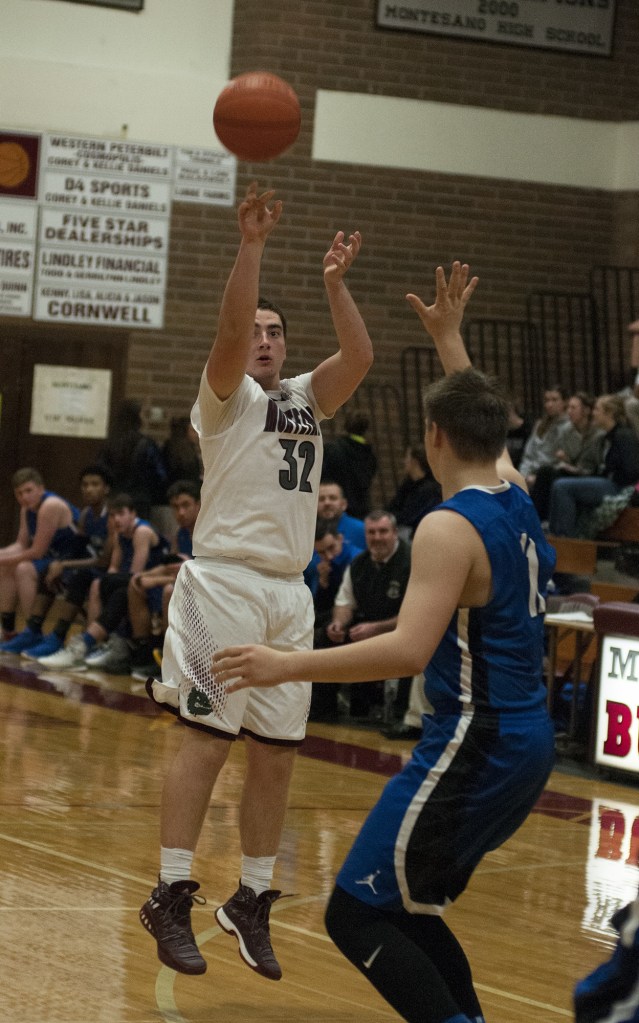 (Brendan Carl | The Daily World) Montesano&rsquo;s L.J. Valley shoots a 3-pointer against Eatonville on Friday.