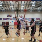 (Brendan Carl | The Daily World) Willapa Valley&rsquo;s Peter Hamilton rolls in a layup against Ocosta in a Pacific 2B League game at Tenoski Gym on Monday.