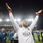 Charis Wilson | Sounders FC Seattle Sounders FC Goalkeeper Stefan Frei motions to the crowd cheering his name following his stellar MLS Cup game and MVP award. Seattle celebrates its first MLS Cup with a 0-0 (5-4) win over Toronto FC on Saturday.