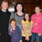 (Jeanne Weaver photo)                                Judge Stephen Brown stands with Denise Schmoe and her daughters on National Adoption Day at Superior Court where six foster children were adopted into local families. From left: Judge Stephen Brown, Abigail, 7, Denise Schmoe, Arin, 10 and Breanna, 13.
