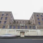 (Kyle Mittan | The Daily World) Traffic passes in front of the Morck Hotel along South K Street on Friday afternoon. The hotel was added to the state&rsquo;s Heritage Register on Friday, and has been nominated for the National Historic Register, a designation that could provide tax credits to go toward the building&rsquo;s renovation.