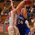 (Patti Reynvaan) Hoquiam&rsquo;s Kylee Bagwell blocks Elma&rsquo;s Molly Johnston&rsquo;s shot during Friday&rsquo;s Evergreen 1A League matchup at Hoquiam Square Garden. Johnston still led all scorers with 13 points for Elma.