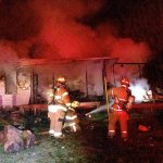 Firefighters from District 5 and the Elma Fire Department responding to reports of a residential structure fire at the end of the 200 block of Newman Middle Branch Road in Satsop arrived to find the home fully engulfed. The resident of the home and her pets were able to escape. The cause of the fire is under investigation. (Grays Harbor Fire District No.5 photo)
