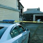The rear section of a vacant apartment building in the 600 block of Eklund Street in Hoquiam caught fire around 9:30 Thursday night. The blaze spread to a couple of garages on the property. Homes on either side of the apartment building escaped major damage. (BOB KIRKPATRICK|THE DAILY WORLD)