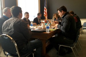 Congressman Derek Kilmer (center at back) sits down for lunch and an update on the TimberWorks Master Flood Relief Plan update Wednesday at Hoquiam City Hall. To the Congressman&rsquo;s immediate left is Hoquiam Mayor Jasmine Dickhoff, to his right Hoquiam City Administrator Brian Shay. Seated with his back to the camera is Aberdeen City Engineer Kris Koski, to his left is Aberdeen Public Works Director Rick Sangder. At right is Nicholas Carr from Congressman Kilmer&rsquo;s staff. Not seen are Hoquiam City Council President Ben Winkelman and Hoquiam Finance Director Corri Schmid.