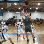 (Brendan Carl | The Daily World)                                Montesano&rsquo;s Trevor Ridgway puts up a layup against Elma in an Evergreen 1A League game at Elma on Wednesday.