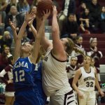 (Justin Damasiewicz | GH Newspaper Group) Elma&rsquo;s Brooke Sutherby and Montesano&rsquo;s Jordan Spradlin battle for a rebound during an Evergreen 1A League game at Bo Griffith Gym on Thursday.