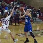 (Justin Damasiewicz | GH Newspaper Group) Elma&rsquo;s Brooke Sutherby shoots over the outstretched arm of Montesano&rsquo;s Josie Toyra.