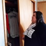 Jennifer Chuks Nwokike looks inside of a closet at Esther House in Aberdeen. This new church-run shelter focuses on providing temporary shelter to women and young children. (Terri Harber|The Daily World)