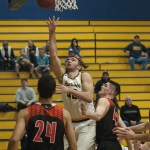 Tall Tigers reach over Bobcats, 73-61