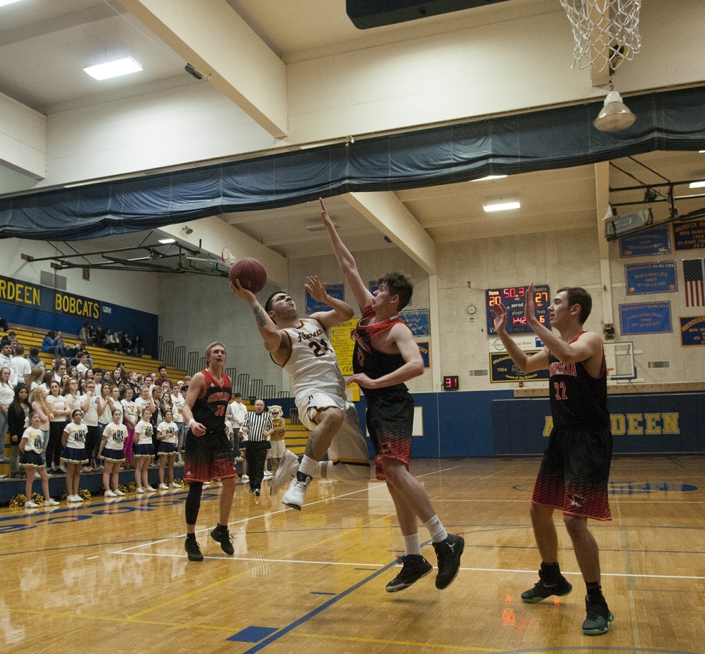 Tall Tigers reach over Bobcats, 73-61