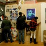 Visitors to the Aberdeen Museum of History Kurt Cobain celebration Saturday were given the opportunity to write a personal greeting for what would have been Cobain&rsquo;s 50th birthday Monday. In the middle is Wil Russoul, local musician. On the right is Longview resident Dolores Erickson, cousin of the woman who provided much of the original artwork in the display and - no kidding - the whipped cream-covered model on the famous Herb Alpert and the Tangerine Dream&rsquo;s 1965 &ldquo;Whipped Cream and Other Dreams&rdquo; album cover.