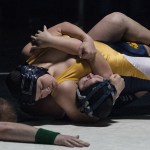 (Brendan Carl | The Daily World) Aberdeen&rsquo;s Karli Heikkila works to pin Skyview&rsquo;s Jennesee Sayler during the Region III girls wrestling tournament on Saturday.