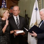 Vice Presdient Mike Pence swears in Betsy DeVos as the Education Secretary in the Vice President&rsquo;s Ceremonial Office of the White House on Tuesday in Washington, D.C. (Olivier Douliery/Abaca Press)