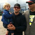 Darrik Seibold, shown here holding his son Eli last year in Alaska, was one of the six crew aboard the Destination, a Seattle-based crabber that went missing Saturday morning. Standing next to him is is younger brother, Dylan Hatfield, who used to crewman on the Destination. (Courtesy Dylan Hatfield/Seattle Times)
