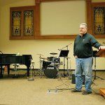 Pastor Kent Gravelly said the stained glass on the wall above the stage came out of the old church building.