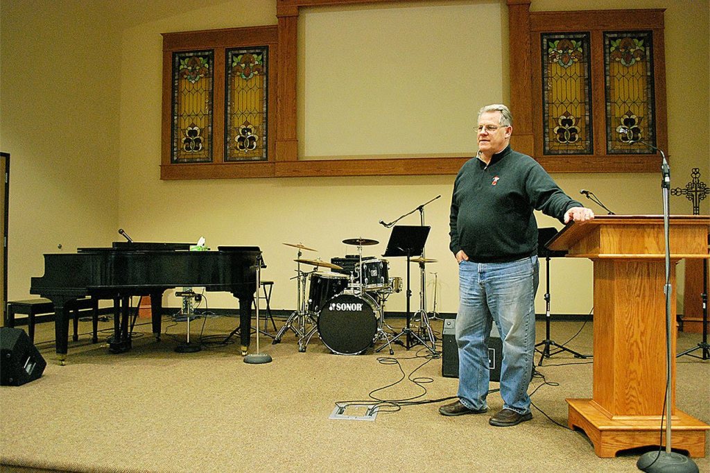 Pastor Kent Gravelly said the stained glass on the wall above the stage came out of the old church building.