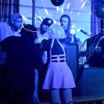 DJs Adam Harris, Kameron Covall and Jerrod Phelps from Harbor Soundwave take a song request. (STEVEN PUVOGEL EVENTS ON EMERSON)