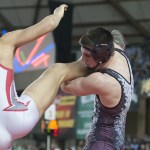 (Brendan Carl | The Daily World) Montesano&rsquo;s Austin Cain works to control the leg of Colville&rsquo;s Thailer Morrison during the final on Saturday.