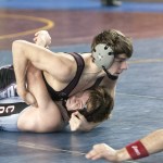 (Brendan Carl | The Daily World) Montesano&rsquo;s Tony Williams pins Colville&rsquo;s Tyler Baun during a consolation bracket match on Saturday.