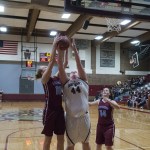 (Brendan Carl | The Daily World) Montesano&rsquo;s Jordan Spradlin stretches to battle for a rebound with Stevenson&rsquo;s Laura Hobbs on Friday.