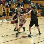(Brendan Carl | The Daily World) Raymond&rsquo;s Mikayla Collins drives to the basket against Ilwaco during a regional 2B girls contest at Chehalis on Saturday.