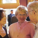 Retired House Majority Leader Lynn Kessler, left, talks with former Senate Majority Leader Sid Snyder and his wife Bette at an open house in Kessler&rsquo;s honor in 2010 at the Polson Museum in Hoquiam. (Dan Jackson | The Daily World)