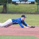 (Brendan Carl | The Daily World) Grays Harbor College&rsquo;s Zach Withrow dives to grab a line drive against Big Bend on Saturday.