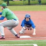 (Brendan Carl | The Daily World) Grays Harbor&rsquo;s Jack Skinner slides back to first during a game against Big Bend on Saturday.