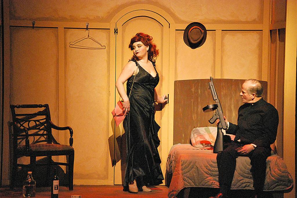 Erma (Julayne Fluery) and Public Enemy No. 13 Moonface Martin (Keith Krueger) plot out their strategy. (BOB KIRKPATRICK|THE DAILY WORLD)