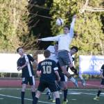 (Brendan Carl | The Daily World) Hoquiam&rsquo;s Gregory Dick goes airborne to try and head the ball toward the goal against Seton Catholic on Thursday.