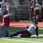 (Brendan Carl | The Daily World) Montesano&rsquo;s Lexi Lovell slides home to score the Bulldogs second run of the game against Hoquiam on Thursday. The Bulldogs defeated the Grizzlies 6-5.