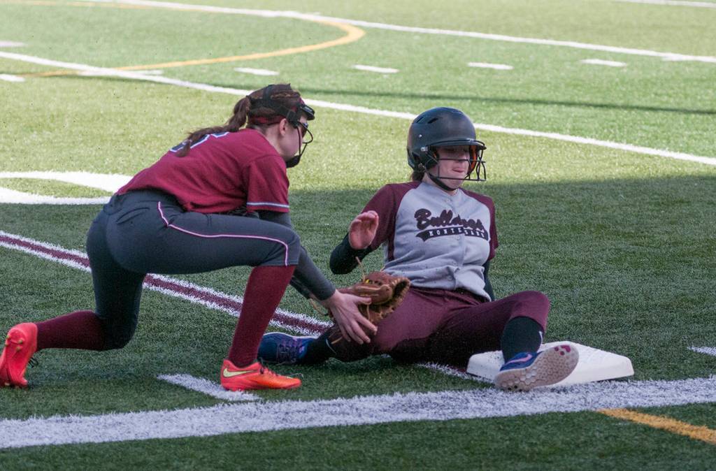 (Brendan Carl | The Daily World) Montesano&rsquo;s Lexi Lovell slides into third, just under the tag of Hoquiam&rsquo;s Jade Cox.
