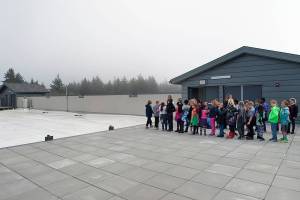 PETE ECKERT ECKERT & ECKERT PHOTOGRAPHY                                Ocosta Elementary School students line up as part of a tsunami drill at the school&rsquo;s evacuation platform. A community-wide tsunami drill will take place Saturday at 11 a.m.