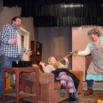 Opal (Debby Sturgill) helps Granny (Liz McCollum), center, get over her &ldquo;fit&rdquo; as Norman (Dale Larson) looks on in a scene from &ldquo;Opal&rsquo;s Baby.&rdquo;