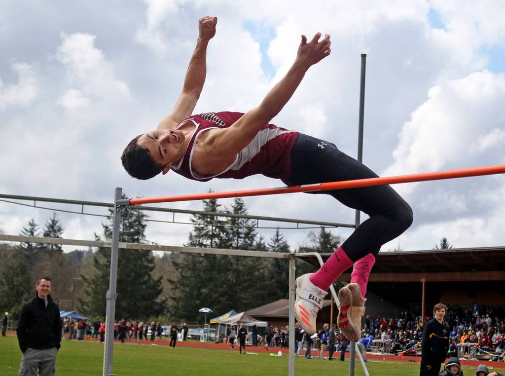 (Brendan Carl | The Daily World) Hoquiam&rsquo;s Devin Merksick cleared a height of 6-4 to win the boys high jump on Saturday.
