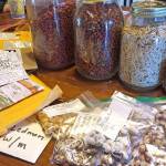 Susan Ardis/The State                                 Rodger Winn uses Masonm jars to save heirloom vegetable seeds from plants he grows