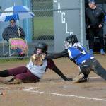 Bulldogs swing in the rain to beat Elma