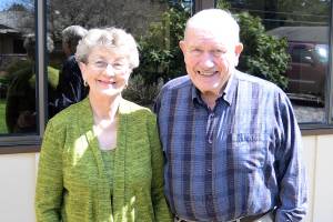 DAN HAMMOCK THE DAILY WORLD                                Dr. Eugene Schermer and his wife Eileen pose outside their Aberdeen home. The two have been married nearly 60 years and have a decades-long history of community service to benefit the less fortunate of the region.