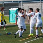 (Brendan Carl | The Daily World) Aberdeen&rsquo;s Cesar Corona (9) is congratulated by teammates after scoring the game-winning goal against Hockinson on Saturday.