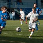(Brendan Carl | The Daily World) Aberdeen&rsquo;s Miguel Torres tries to beat Ridgefield defender Cole Wagner to the ball on Tuesday.