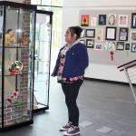 Courtesy photo                                Grays Harbor College student Cecilia Jimenez views artworks in the annual High School Juried Art Exhibit on display at GHC&rsquo;s Spellman Library.