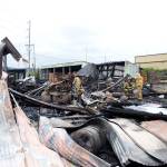 DAN HAMMOCK THE DAILY WORLD                                Firefighters were still mopping up the scene of a fire at a cedar furniture manufacturing facility in Hoquiam at noon Wednesday. The fire was reported about 4:30 a.m.