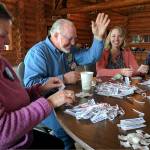 MaryAnn Bagwell | The Daily World                                Members of the Aberdeen Lions prepare white canes Monday for distribution to donors.