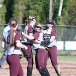 (Brendan Carl | The Daily World) Montesano&rsquo;s Samantha Stanfield, left, Morgan Kersker, center, and Allyssa Gustafson celebrate after the Bulldogs defeated Elma 3-1 on Wednesday.