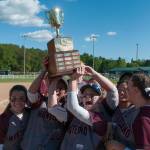 (Brendan Carl | The Daily World) Montesano&rsquo;s Cheyann Bartlett (7) and Josie Toyra hoist the district title trophy after the Bulldogs defeated La Center 5-0 on Saturday.