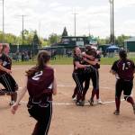 (Brendan Carl | The Daily World) Ocosta players celebrate defeating Adna 6-2 to earn the school&rsquo;s first ever state tournament berth on Saturday.