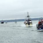 Photo by Kat Bryant | The Daily World                                 The line formed behind the Coast Guard vessel for the Parade of Boats.