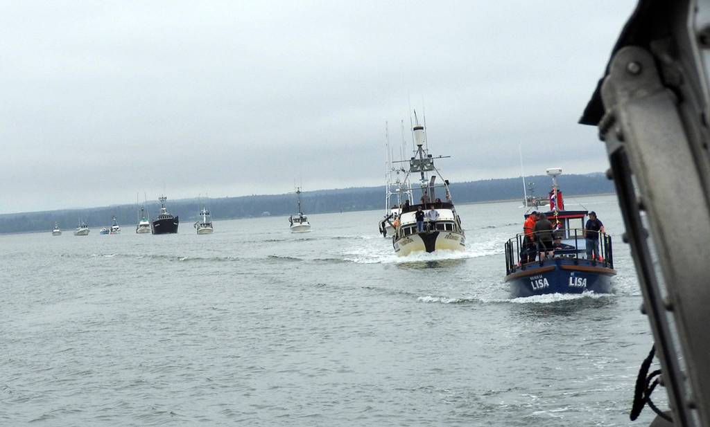 Photo by Kat Bryant | The Daily World                                 The line formed behind the Coast Guard vessel for the Parade of Boats.